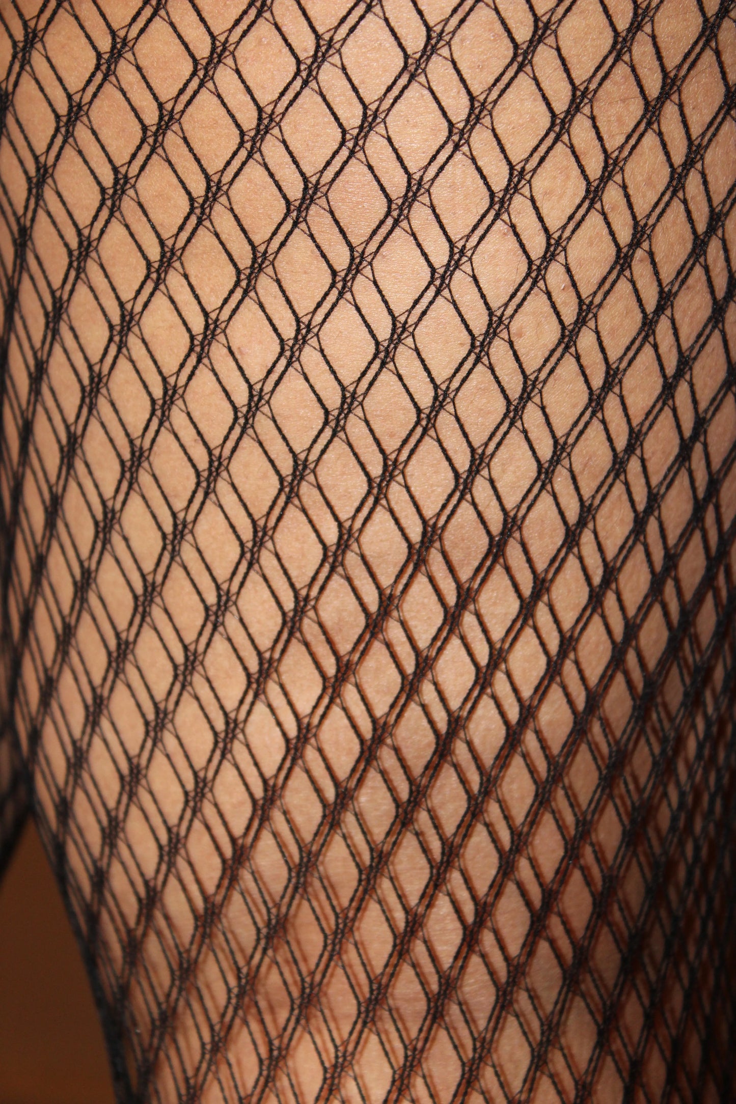 DEVOIR sheer full-body stocking with open back and stretch fit