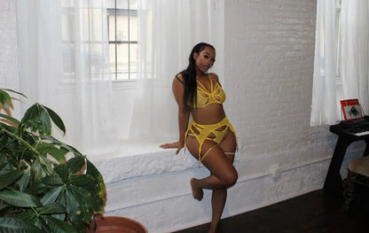 Abstract cut-out thong with strappy design